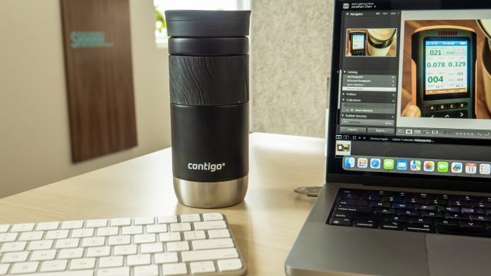 The Contigo Byron travel mug on a desk