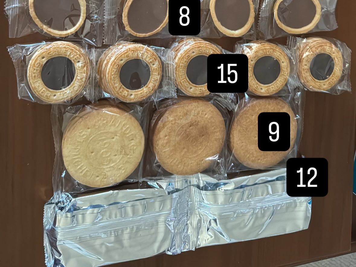 contents-inside-the-st-michel-french-cookie-collection-la-grande-galette-butter-petite-palmier-french-button-cookie-milk-chocolcate-and-caramel-tartlet