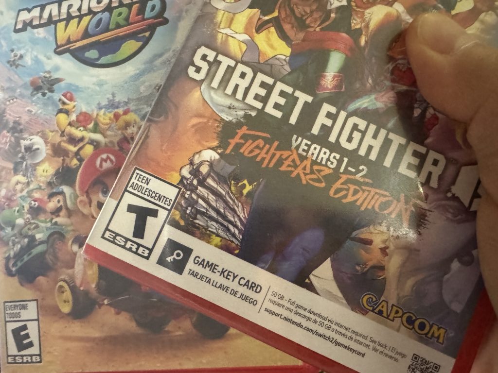 Game Card vs Game-Key Card and Downloadable Games for the Nintendo Switch 2 Showcasing Mario Kart World and Street Fighter 6 Games