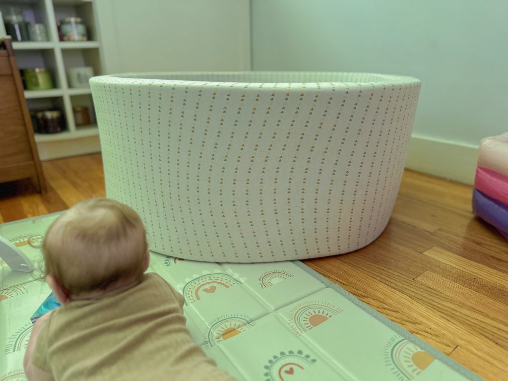 memory foam ball pit and a baby's head