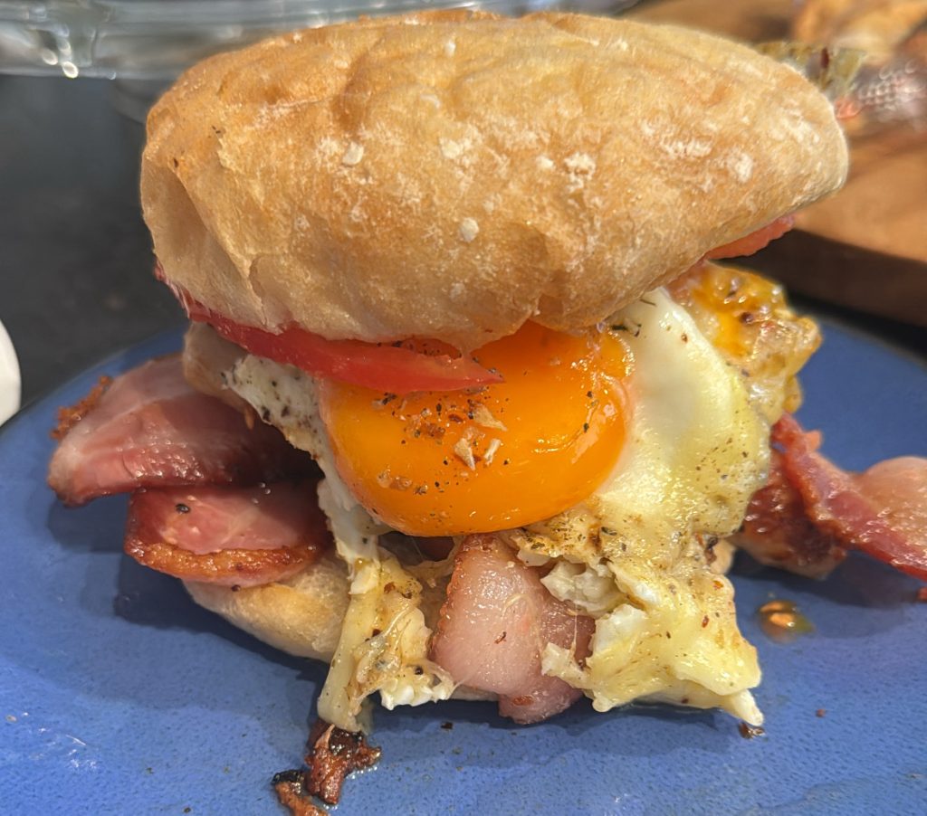 breakfast-sandwich-pan-de-cristal-bread-heirloom-tomato-eggs-sausage-bacon-made-by-smithey-double-burner-griddle-1