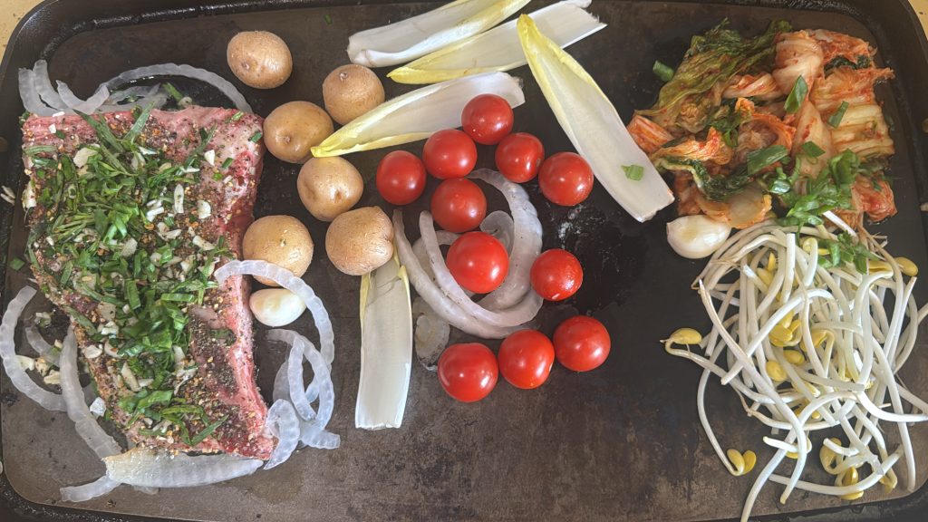 smithey-double-burner-griddle-18-inch-cast-iron-cooking-dry-aged-t-bone-steak-potatoes-cherry-tomatoes-onions-soy-beans-kimchi-before