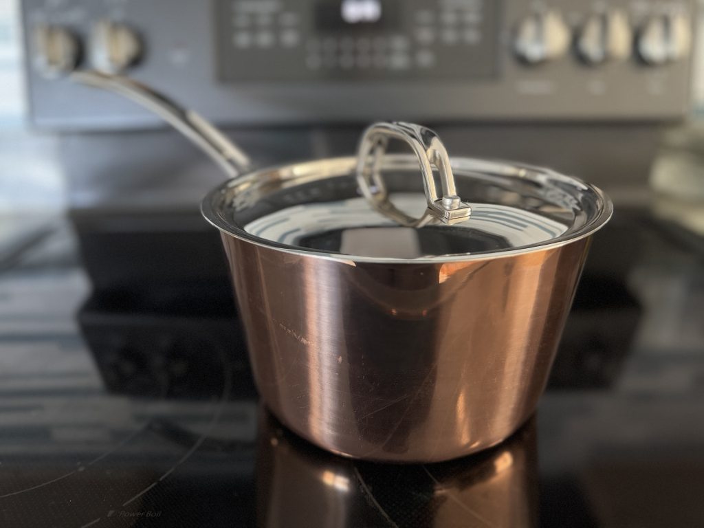 Viking 3-qt saucepan with lid on stove
