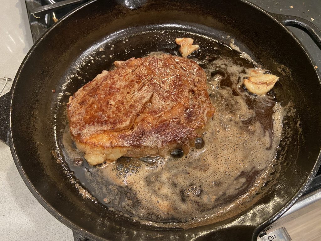 Seared steak in a Lodge skillet