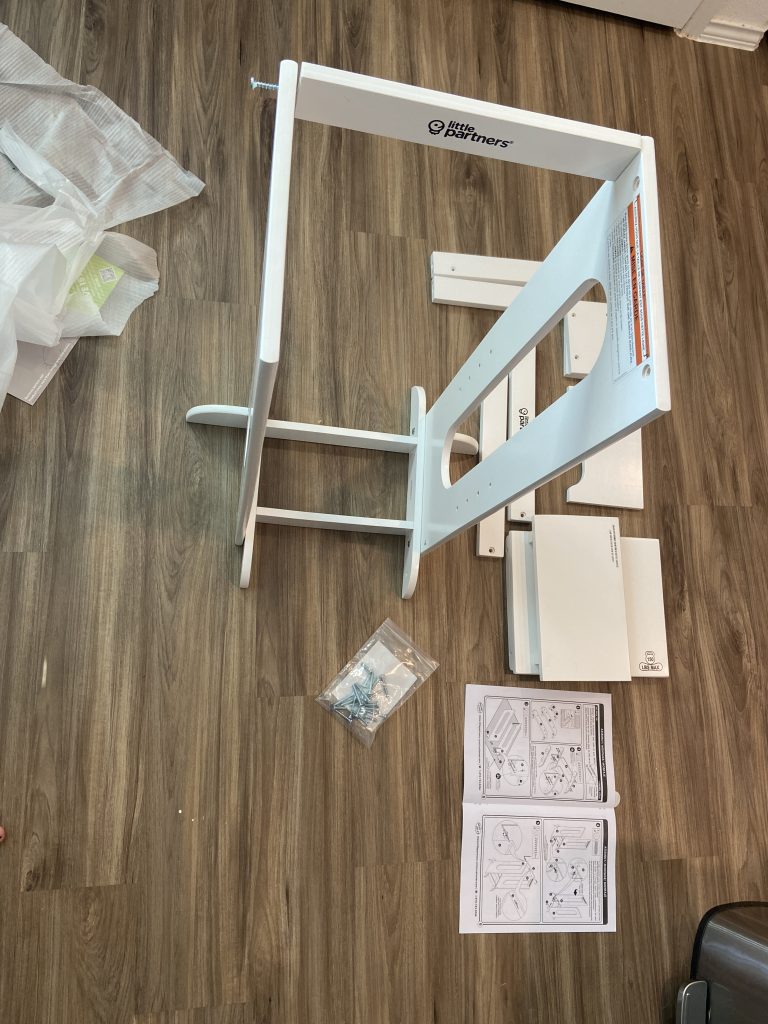 assembling the Explore 'N Store toddler tower